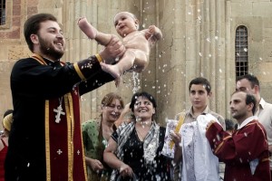 A child is baptized during a mass baptism ceremony in the town of Mtskheta outside Tbilisi